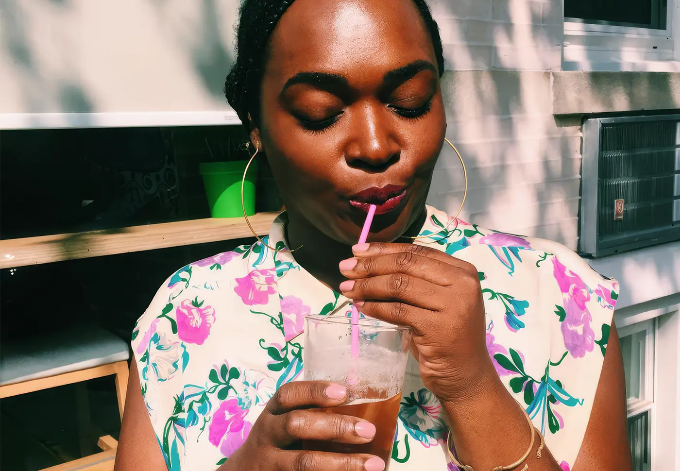 Arlean Gillin sippin Keepers through a straw