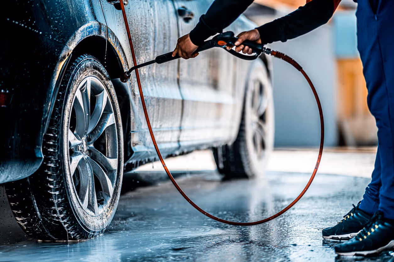 new hampshire commercial insurance for car washes - person self washing a car