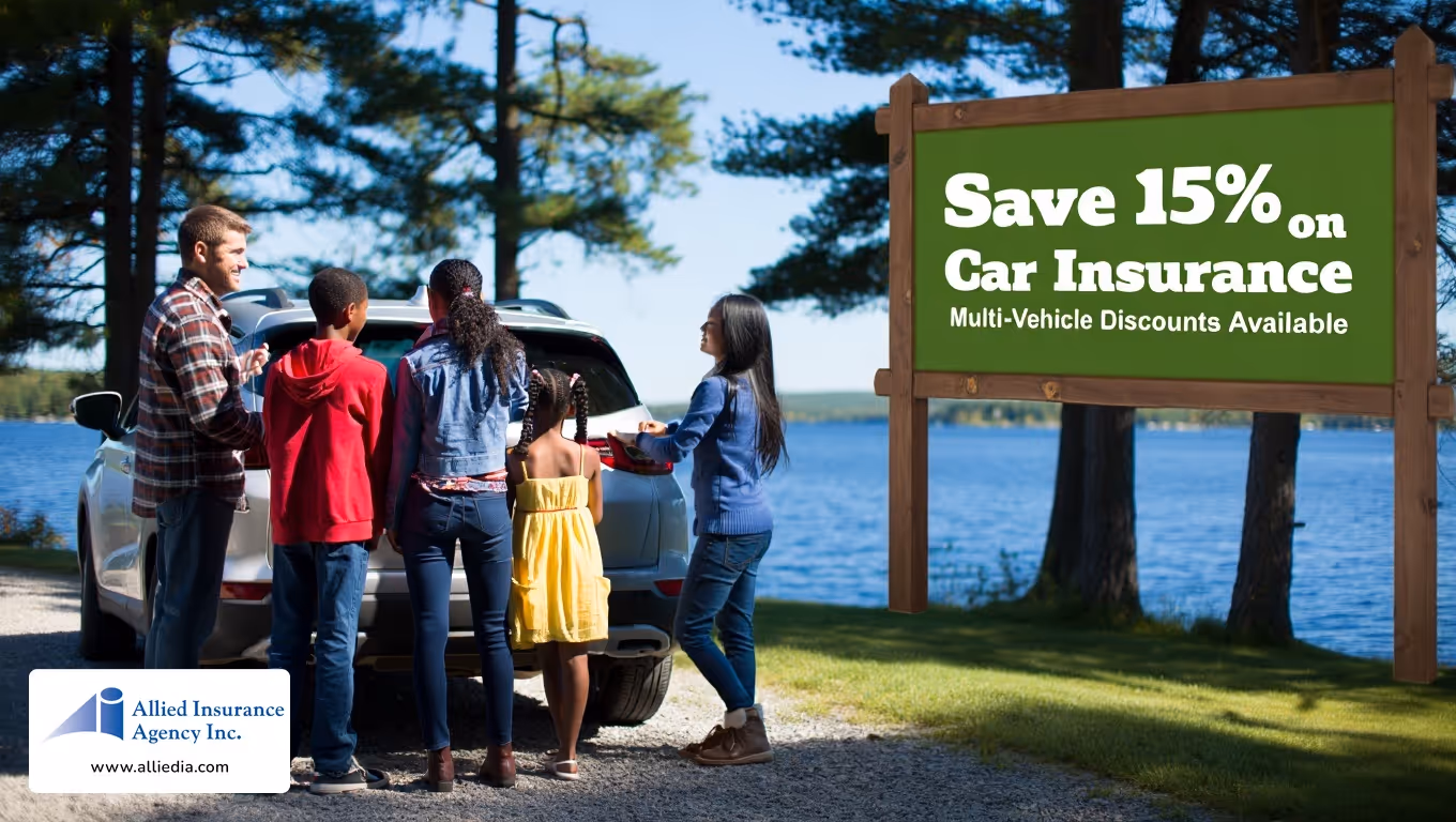 Family unloading car near lake with insurance discount sign
