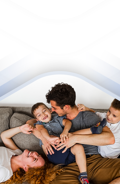 Banner of a family hugging and smiling