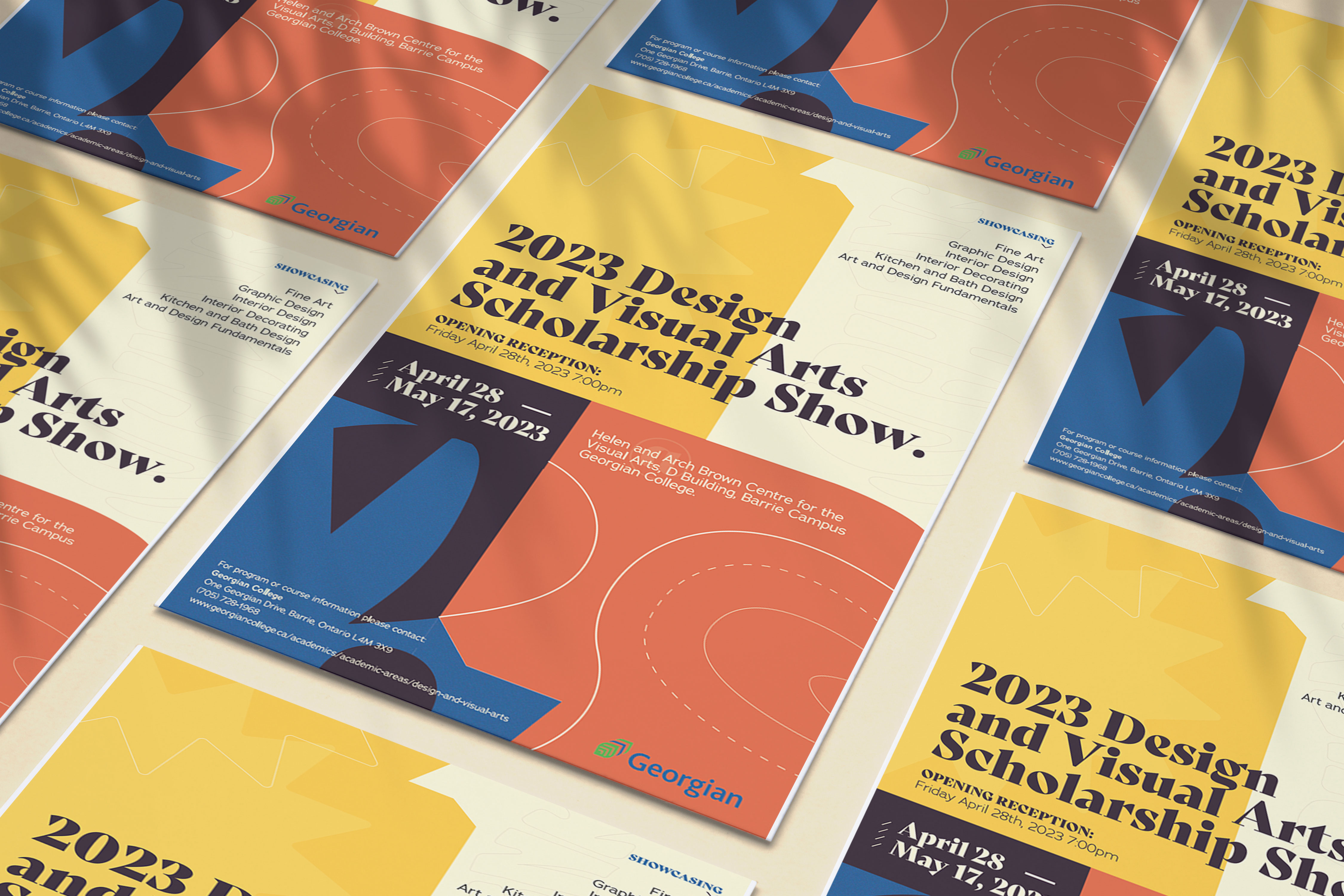 Multiple posters laid out beside and on top of one another.