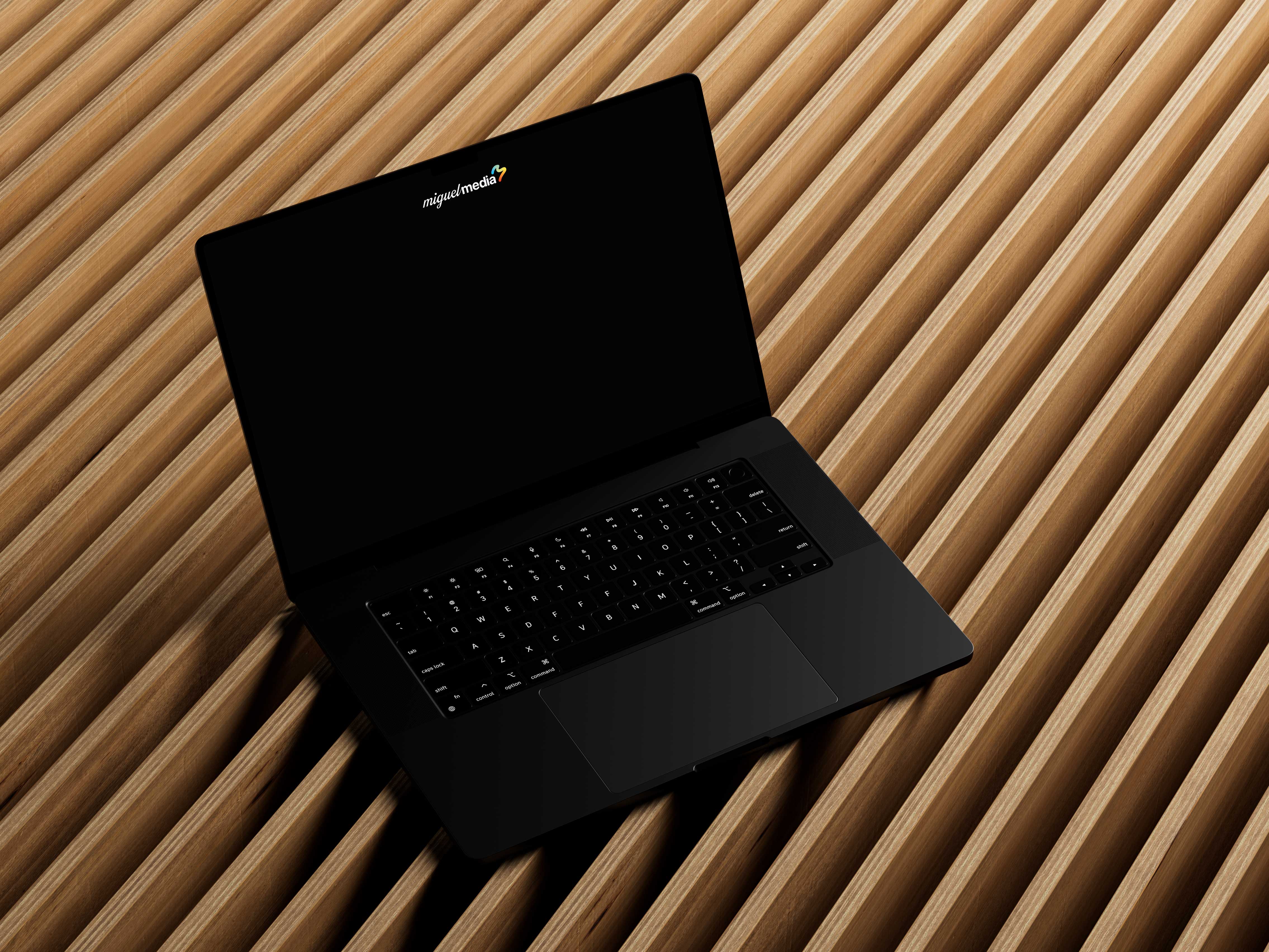 A computer sitting on a wood slat background. 