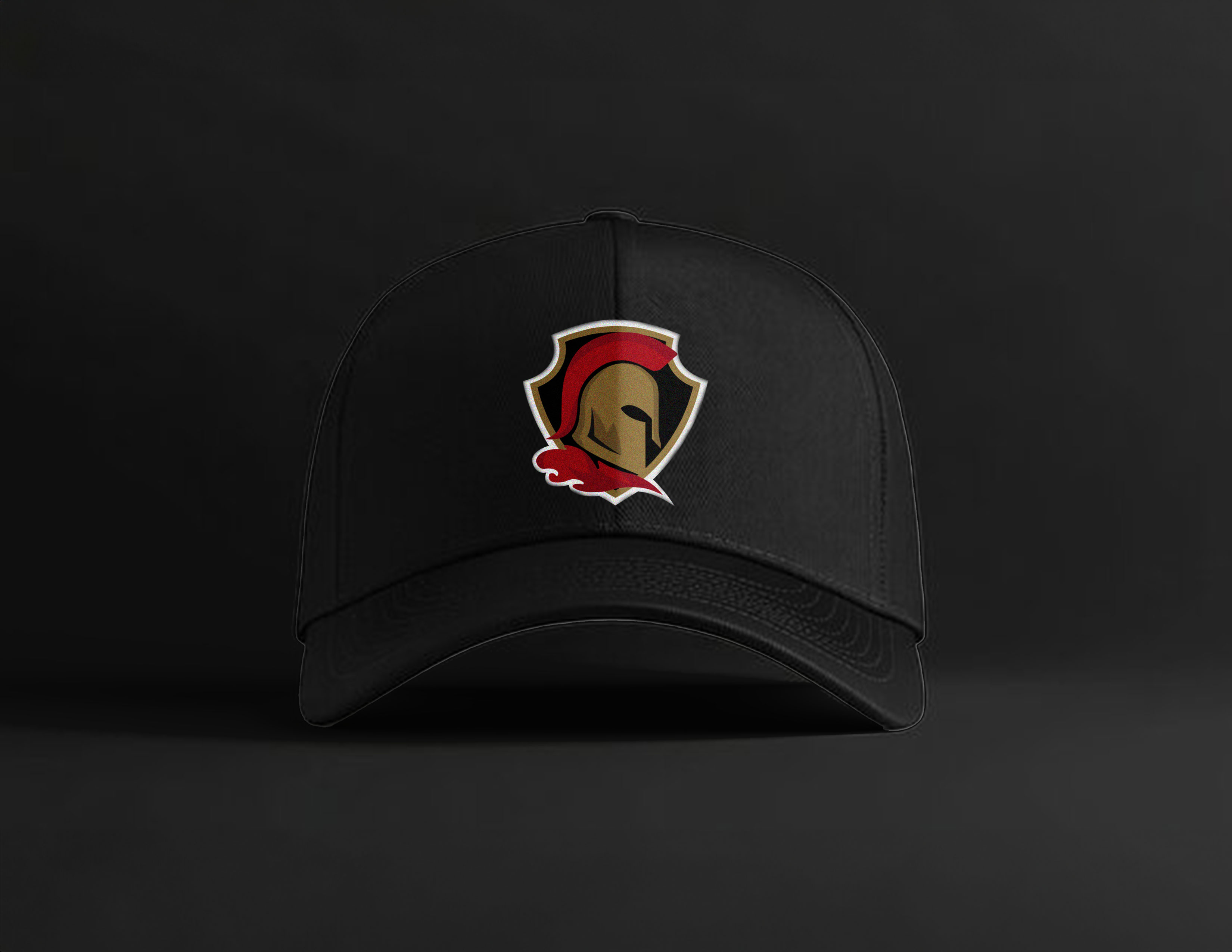 A black ballcap with a Warrior logo embroidered on the front of it.