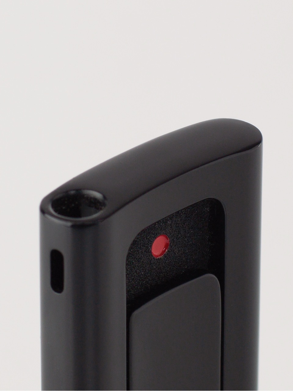 Close-up of the Lydian EP Black lighter showing the ignition switch and curved top