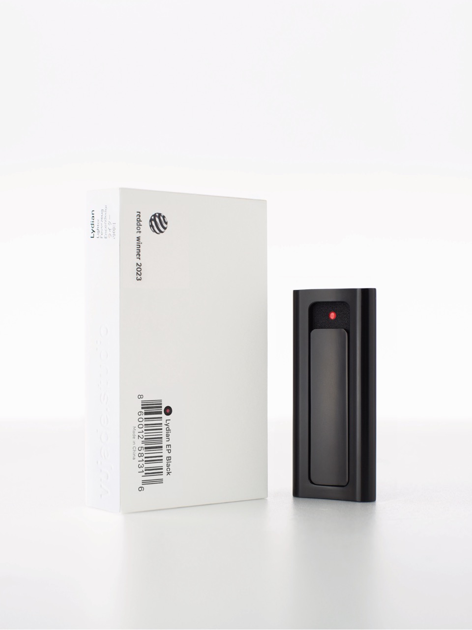 Lydian EP Black lighter beside the back of its packaging