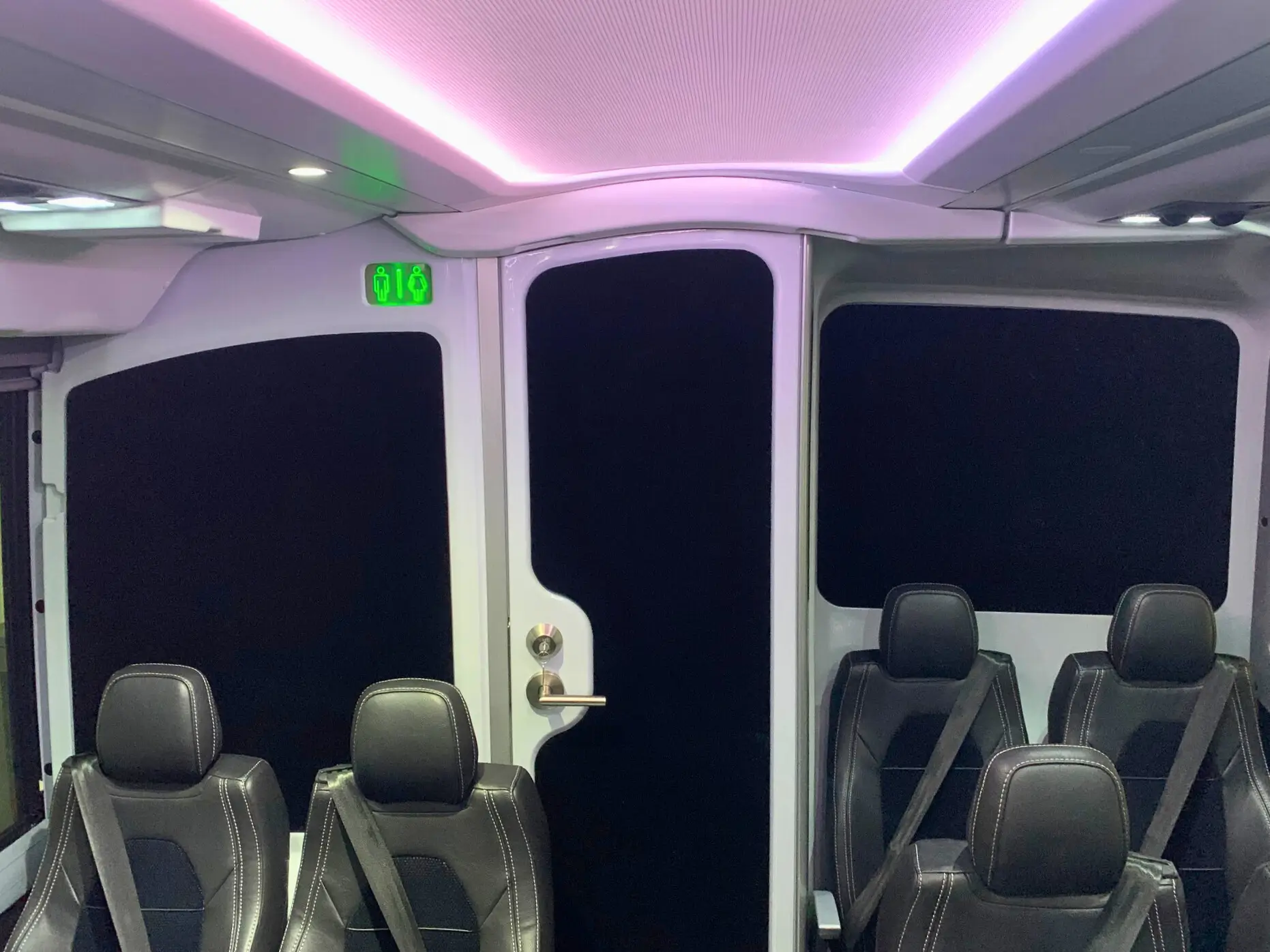 2026 MCI J4500 motorcoach onboard chemical lavatory with Granicote finish for passenger convenience.