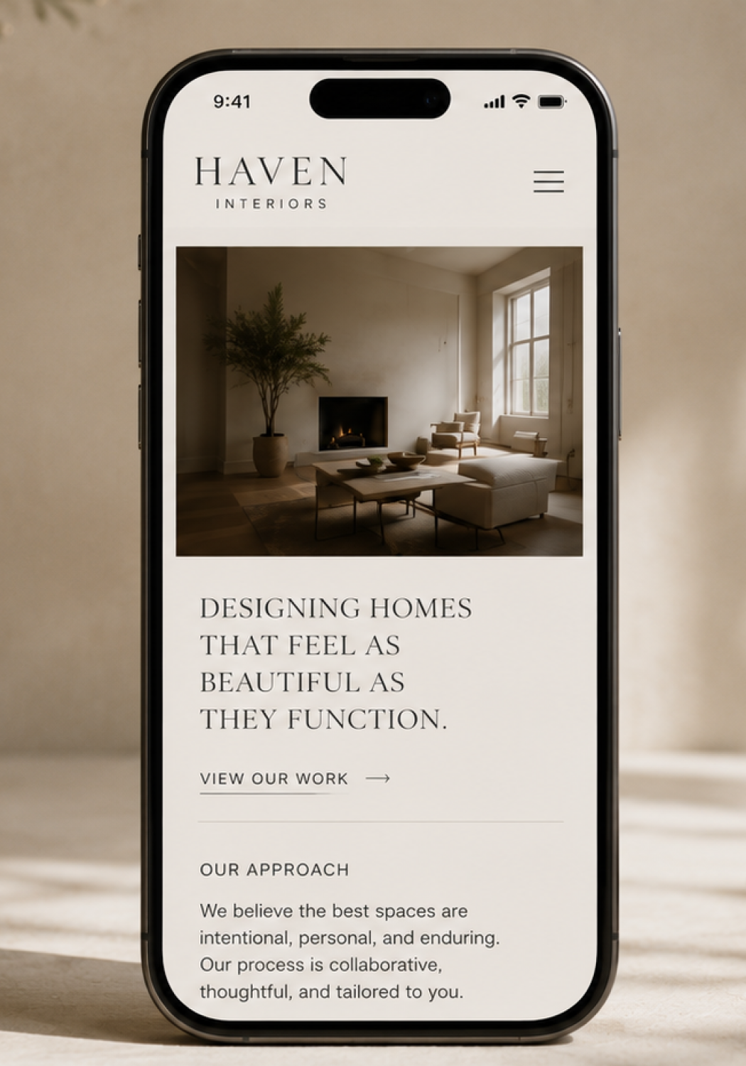 Smartphone screen showing Haven Interiors website with a cozy living room photo and design service text.