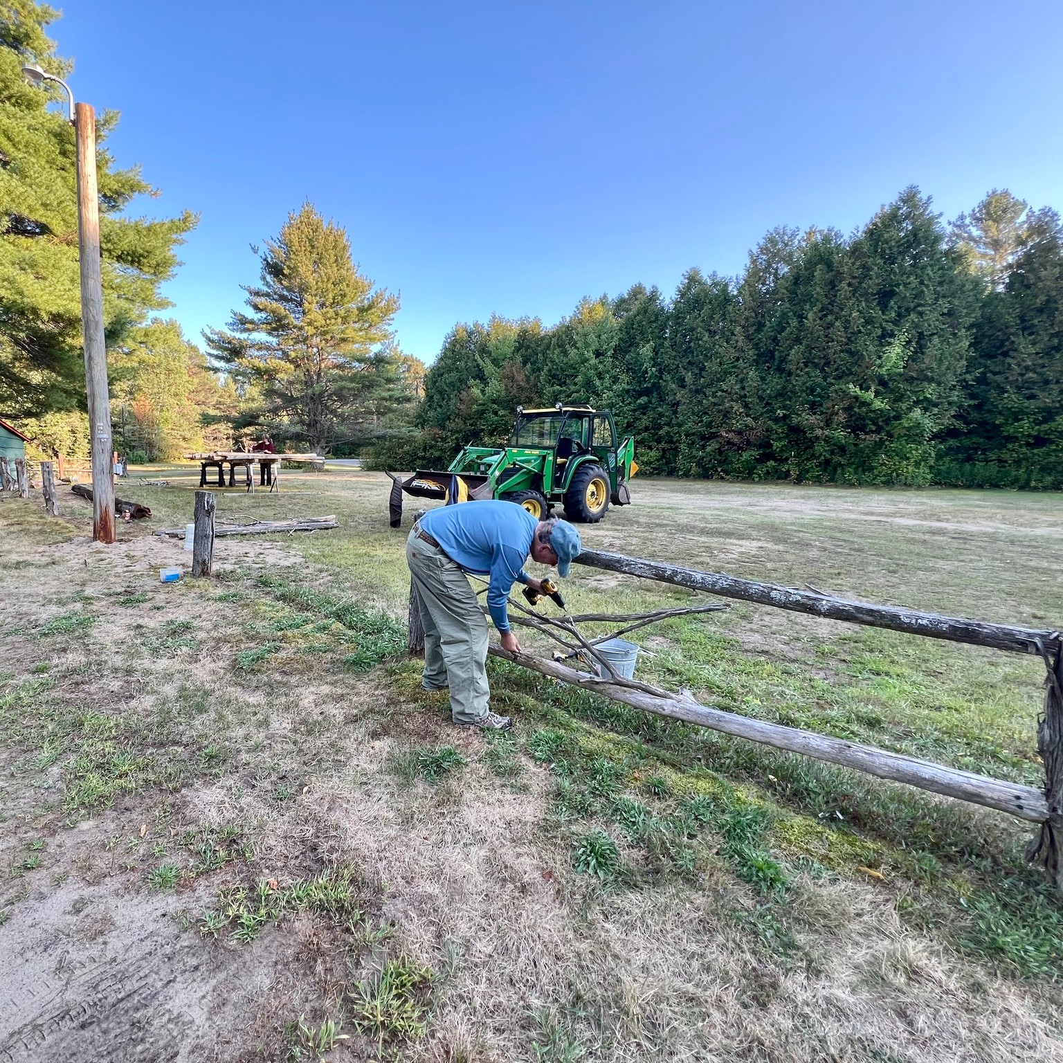 Here at the Lake Clear Lodge, if we don't find the projects, the projects find us! 😂

Our new parking lot light and pole are already installed, and the new fence is coming along.