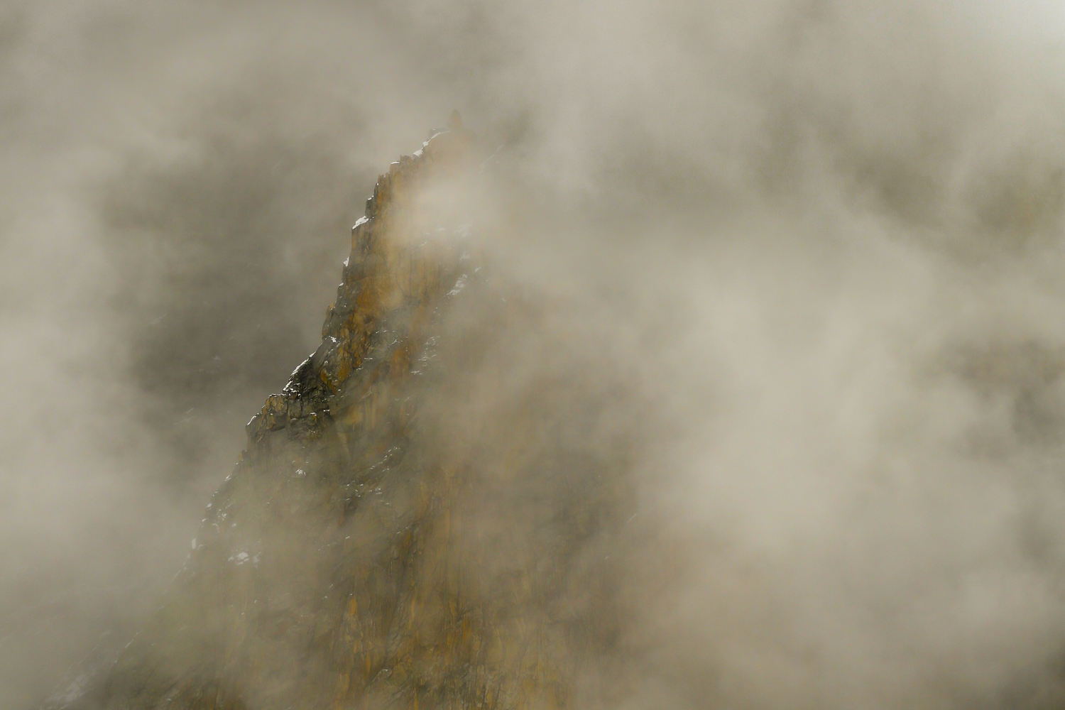 Chamonix, mountain granite disappearing in the fog, minimalist landscape photography