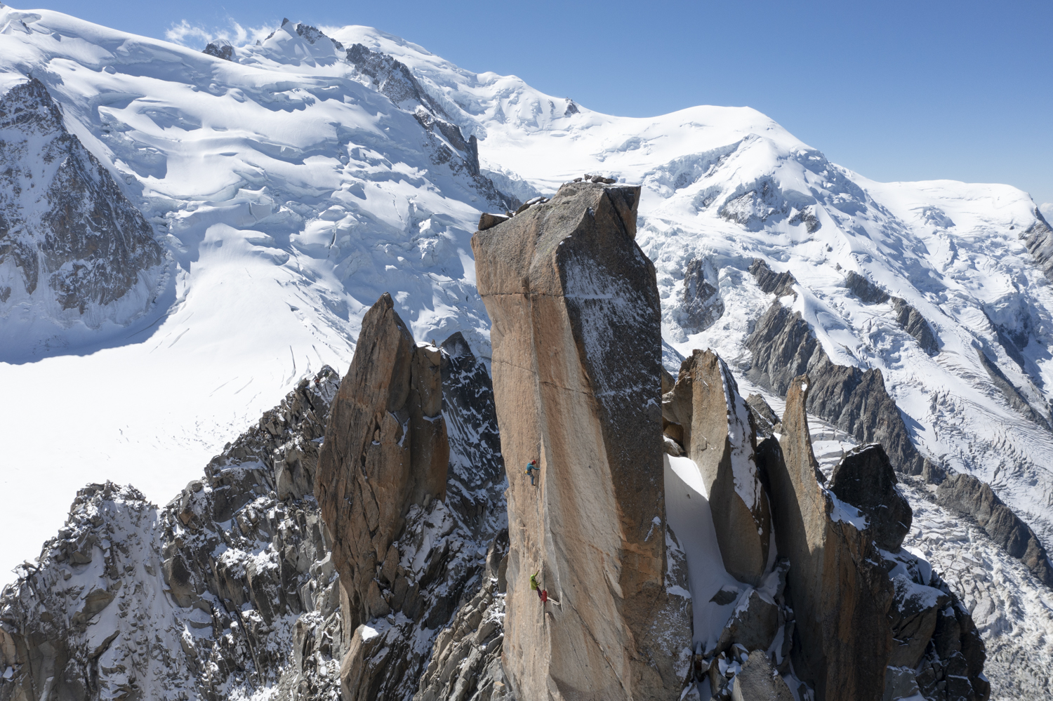 Digital crack rockclimbing in Chamonix with Nasim Eshqi and Sina-Mont-Bland in the background