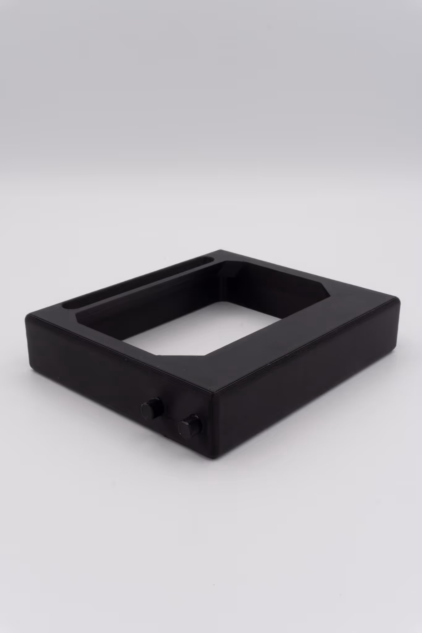 Zwart 3D-geprint vierkant frame met open midden en twee pinnen