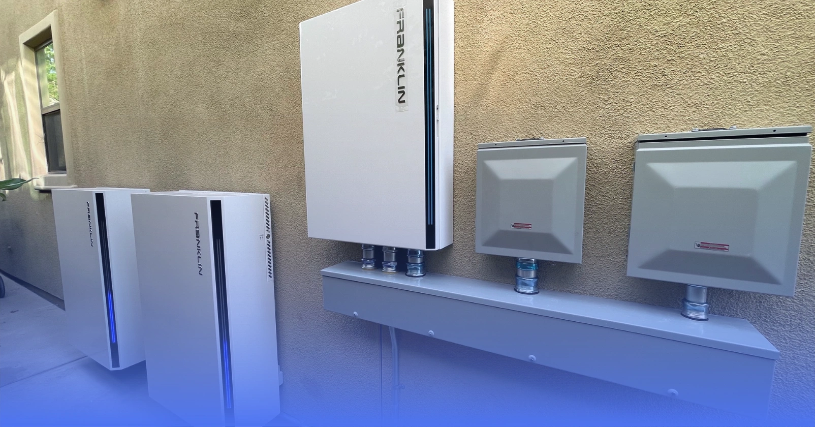 FranklinWH home backup batteries installed on the exterior of a home