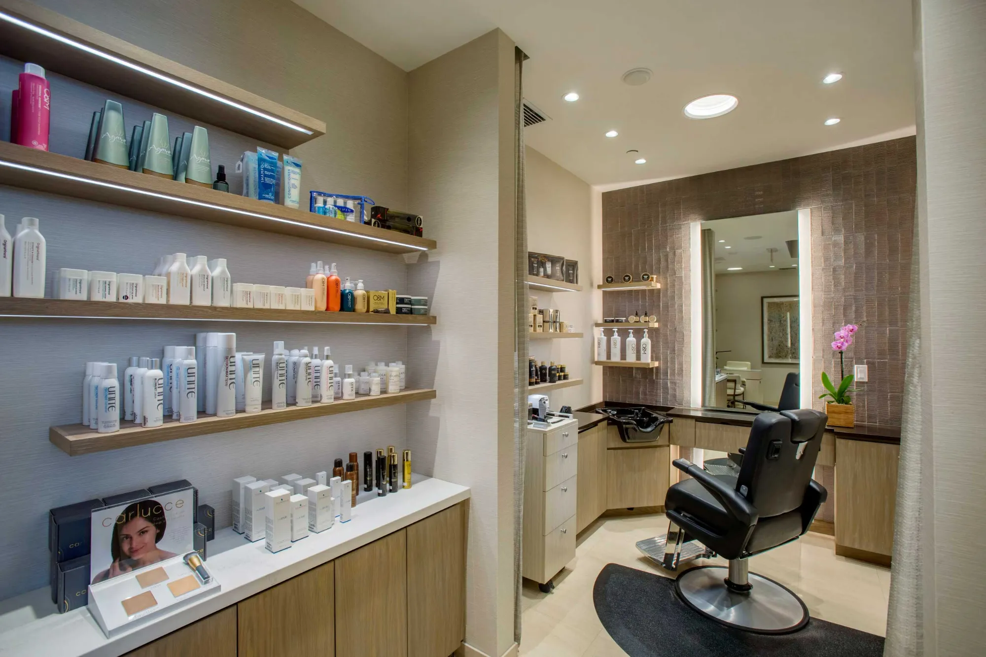 Four Seasons Maui salon treatment station and illuminated retail shelving