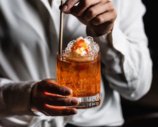 Cocktail in hand