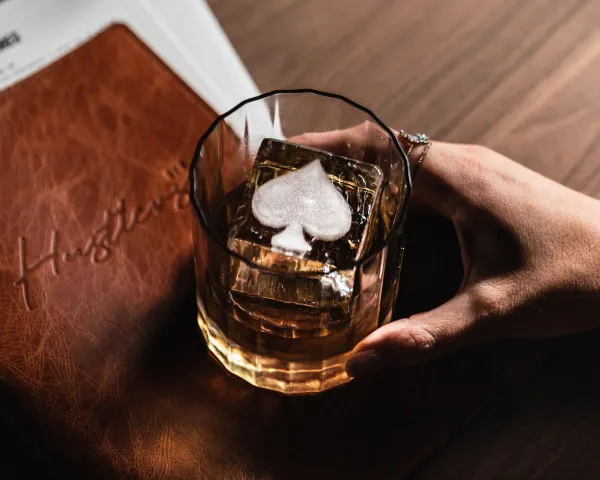 Hustlers ice cube in a cup