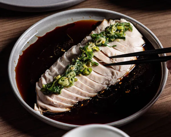 Special poachen chicken with ginger shallots at Hustlers