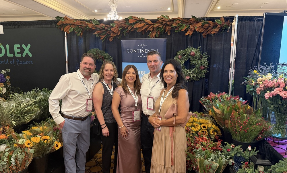 Continental Floral Greens team standing in front of their booth at Fun 'N Sun 2026