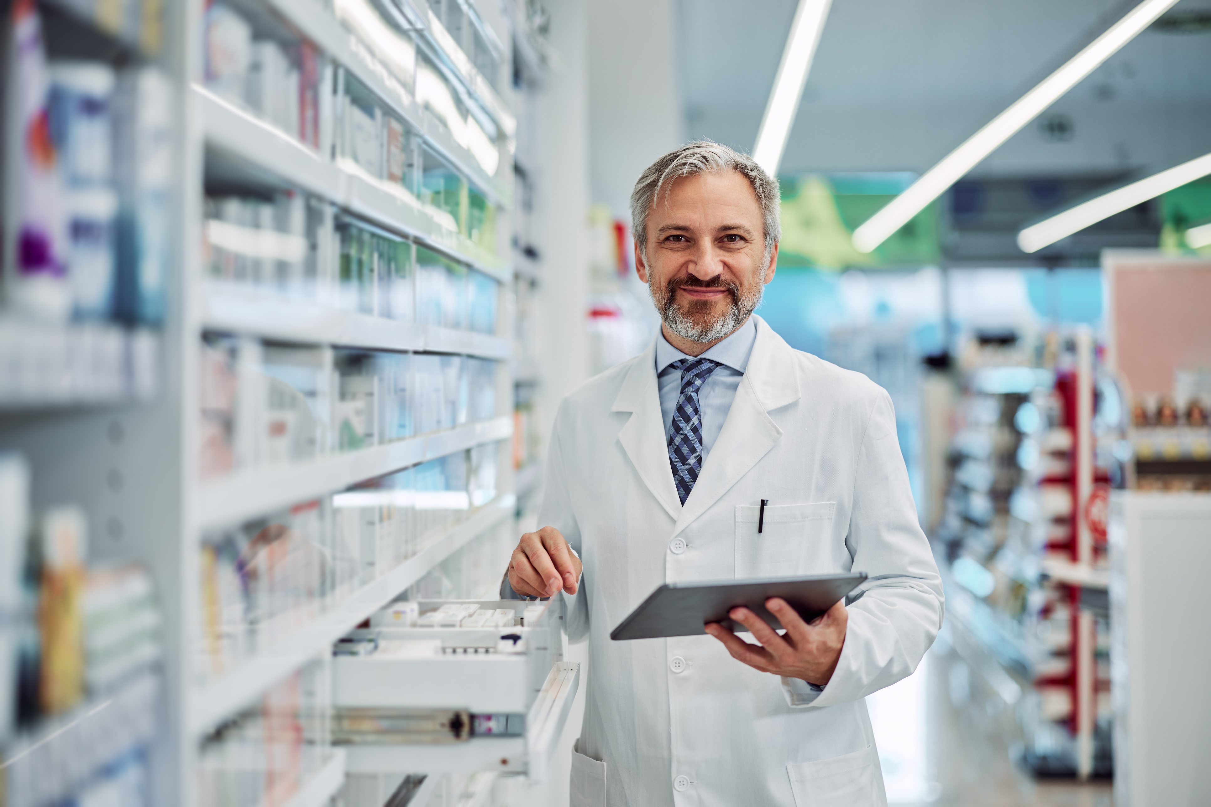 Pharmacist standing and smiling