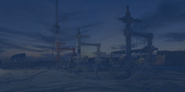 Nighttime photo of a wellsite with a dark blue transparency overtop