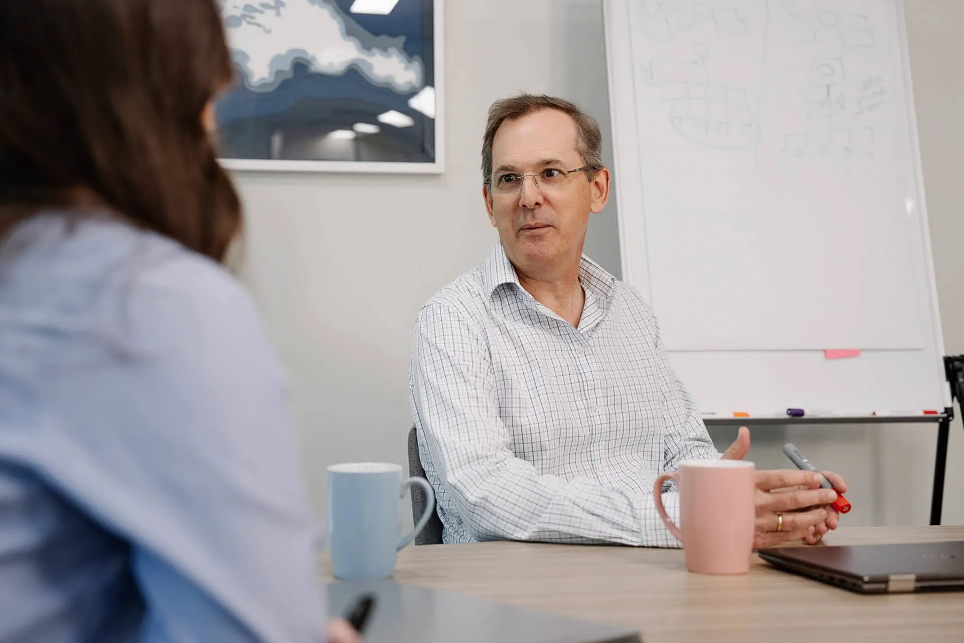 Fuse HR consultants sharing experience and knowledge in their office