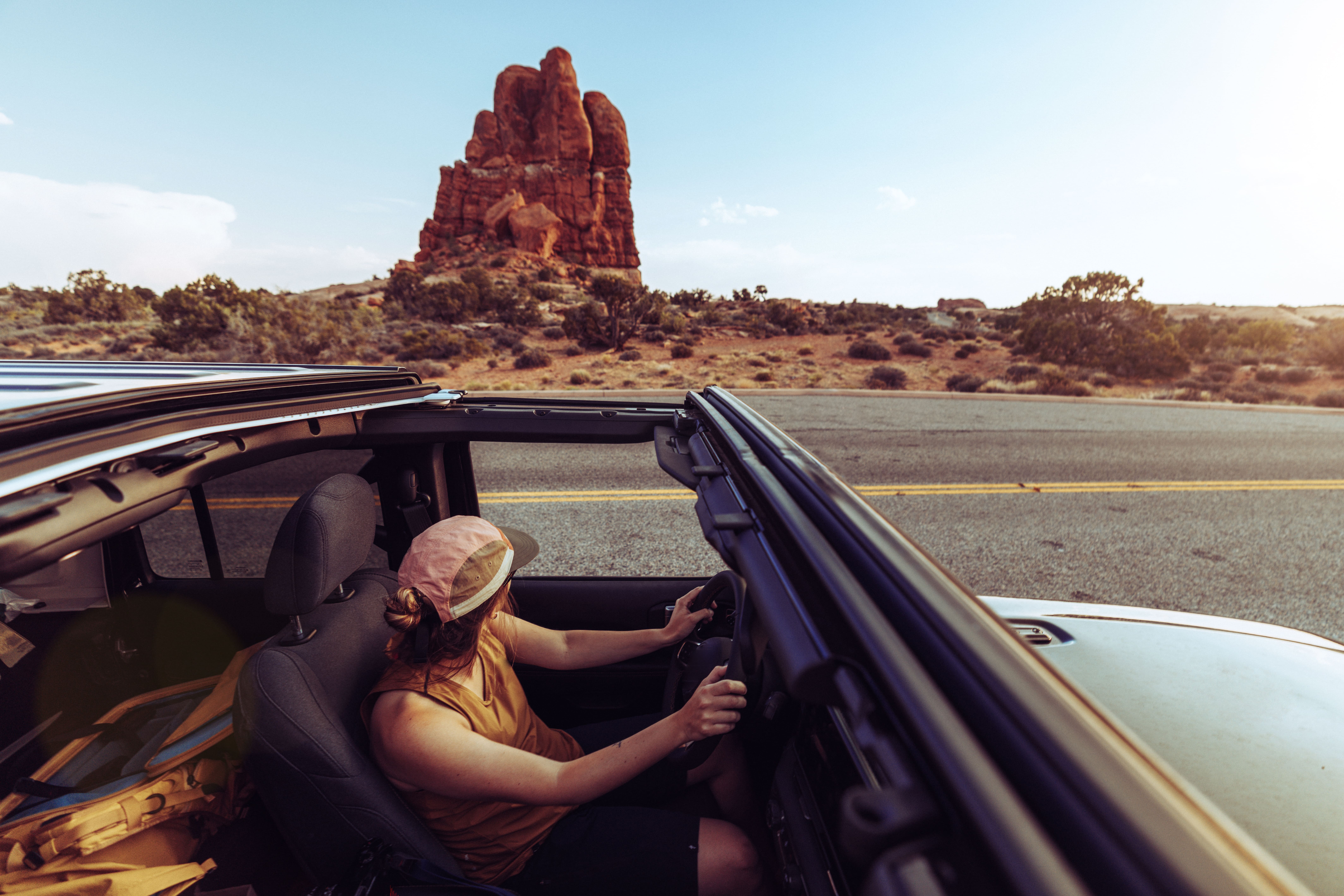 Man enjoying the view while traveling by car