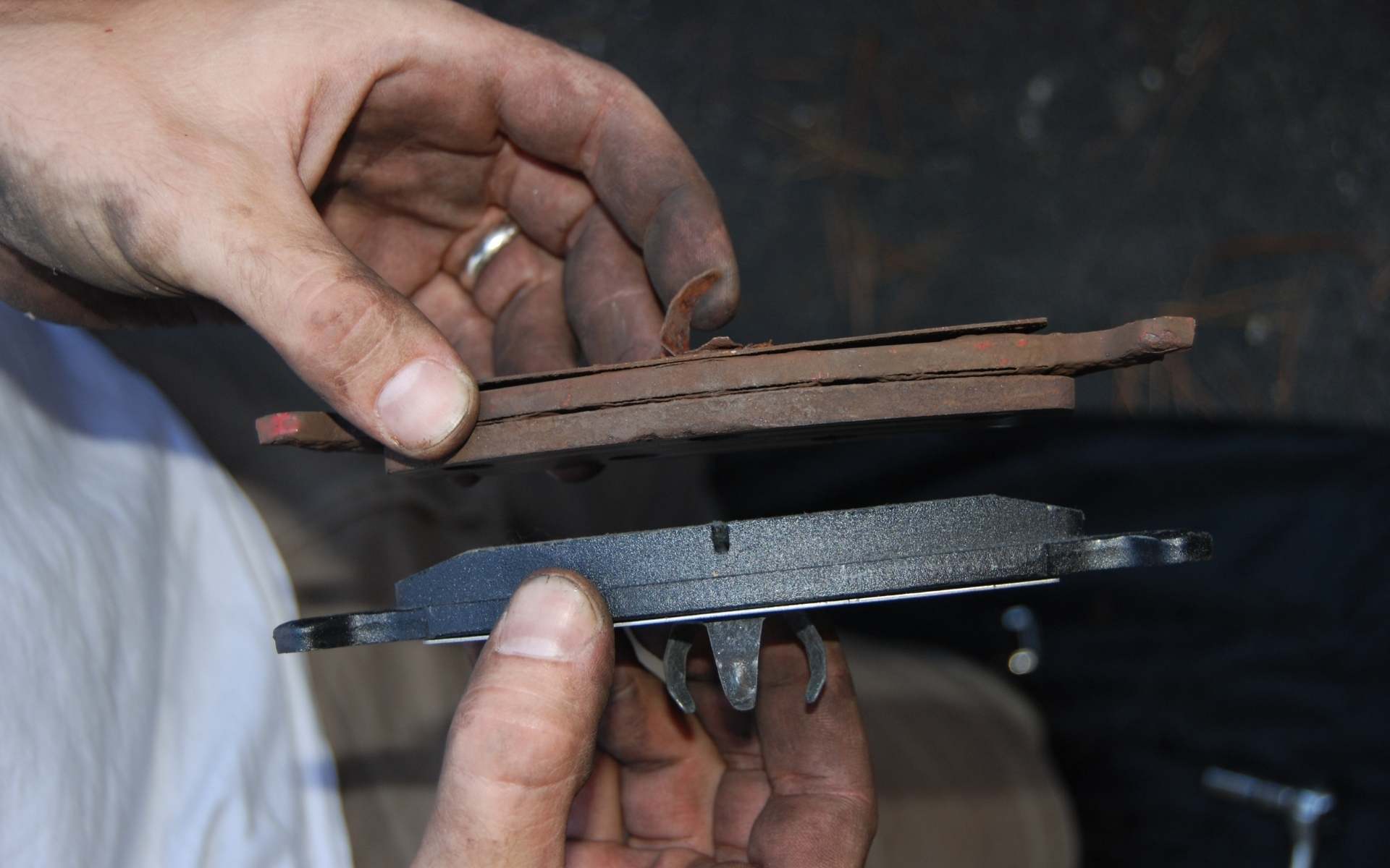 Man checking car air conditioning pressure