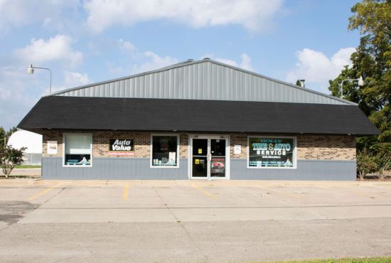 Exterior of Holly Tire & Auto Service in Holly, Michigan, now part of the GreatWater 360 Auto Care network.