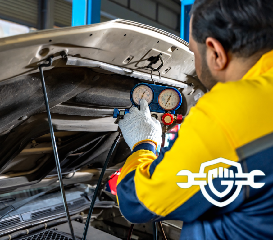 Mechanic checking a car's compressor