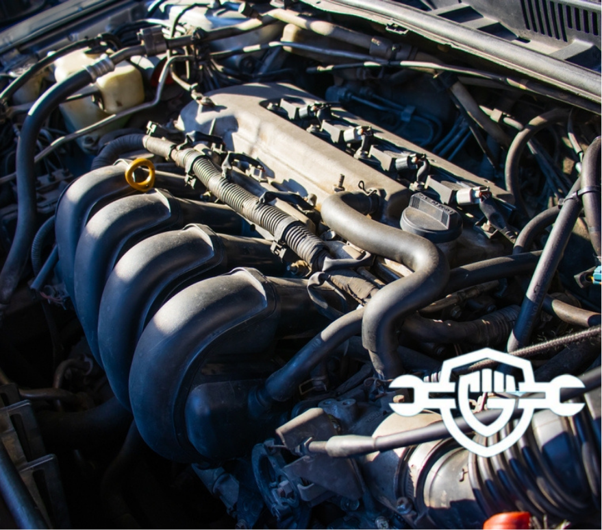 Diesel engine components and fuel injection system under the hood of a vehicle.