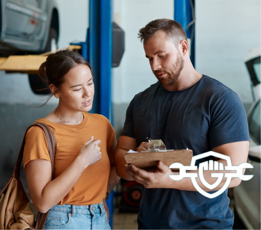 Woman, mechanic and sign quote in auto repair shop, invoice and service for car maintenance bill.