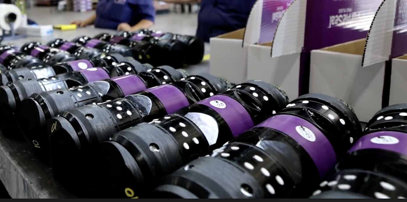 frac plug materials: photo of Purple Seal frac plugs in manufacturing facility