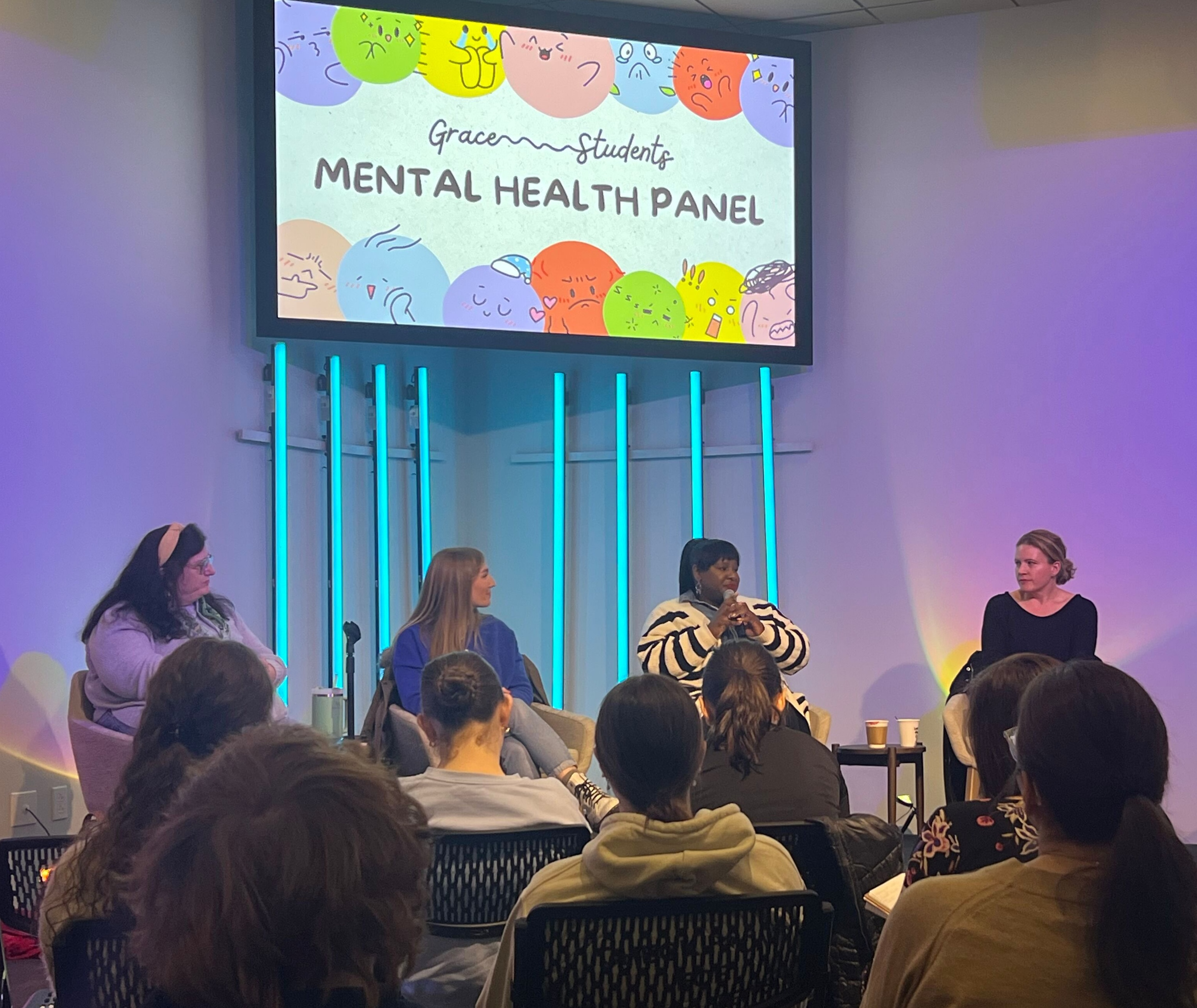 Students at a real-conversations panel night