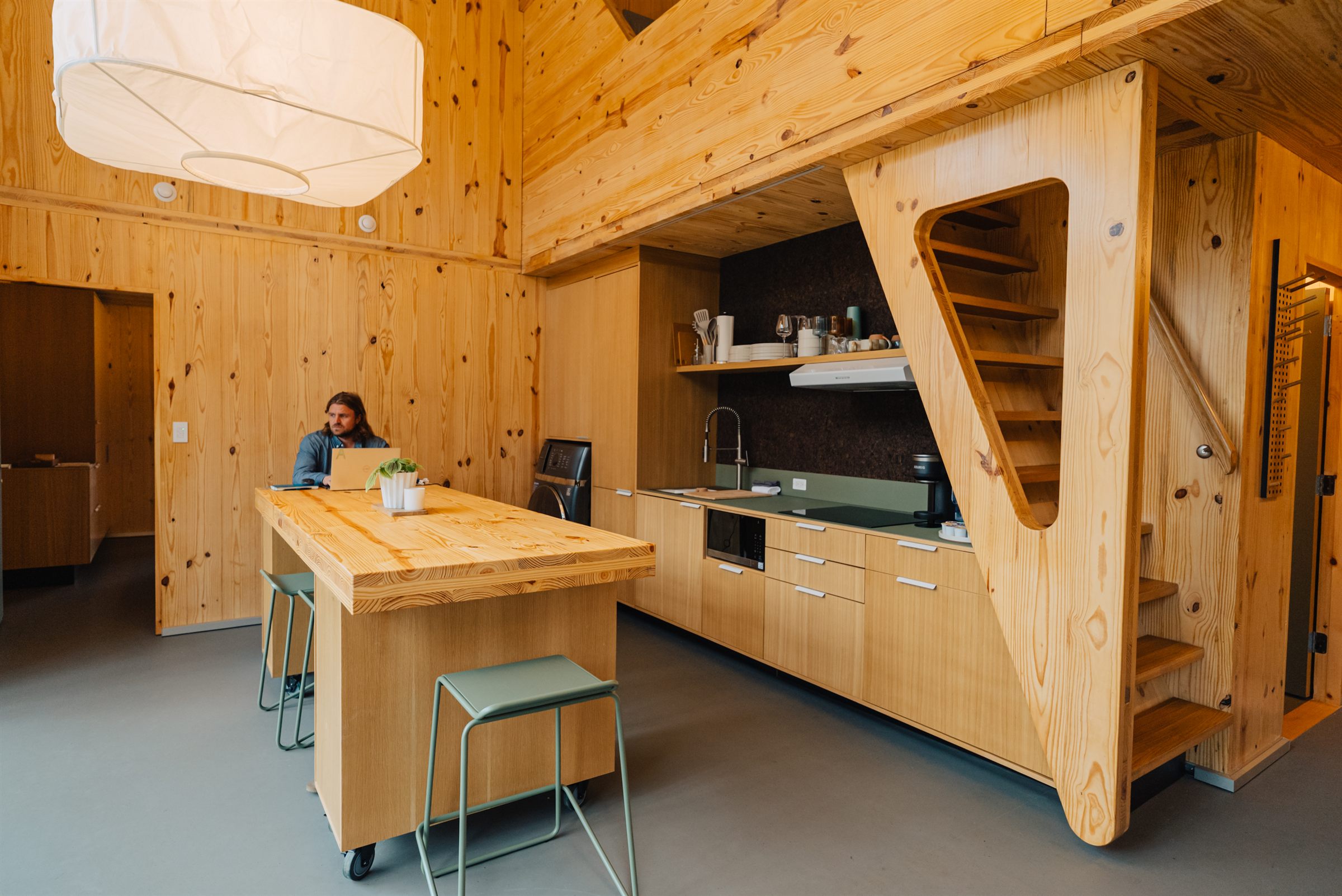 Waters Edge interior detail with wood ceiling and daylight