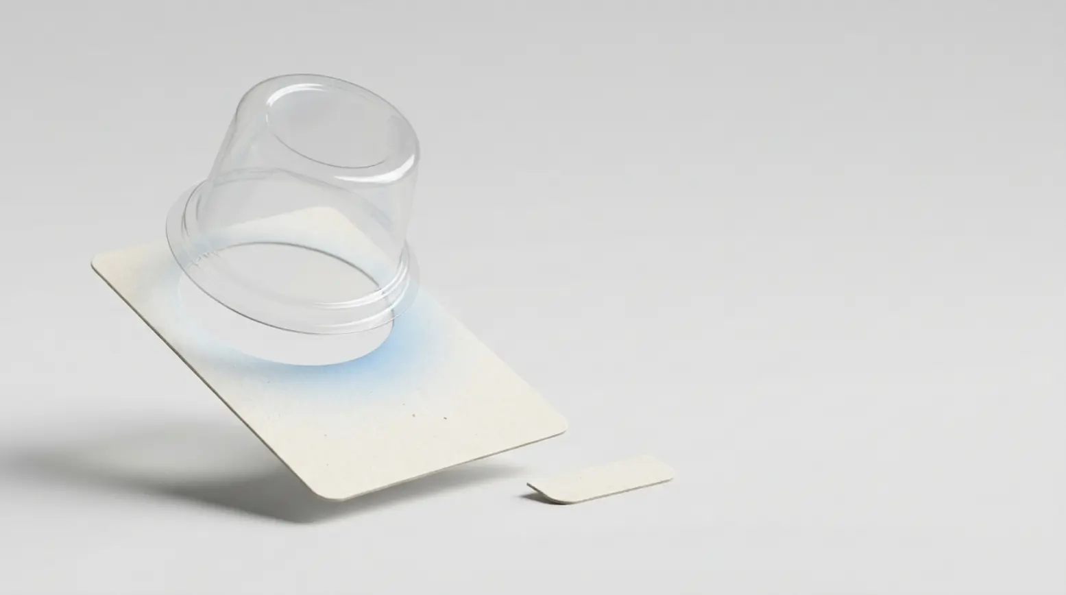 "alt_text: Photorealistic product shot of transparent cup and paperboard card in an elegant layout."
