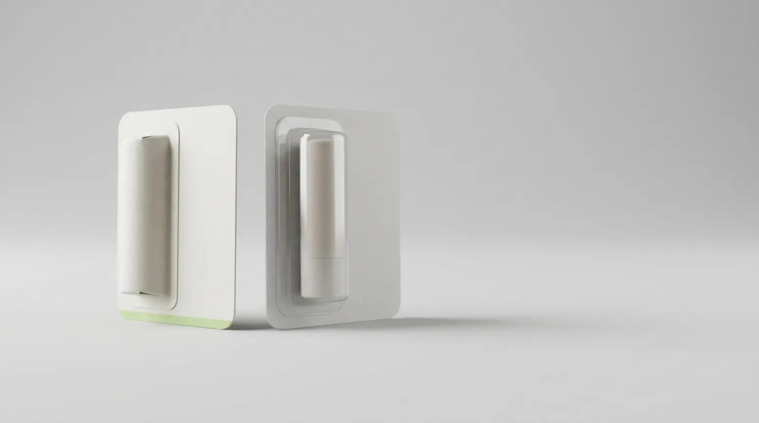 Two compact lip balm packages showcase paper vs. transparent packaging, highlighting material efficiency.