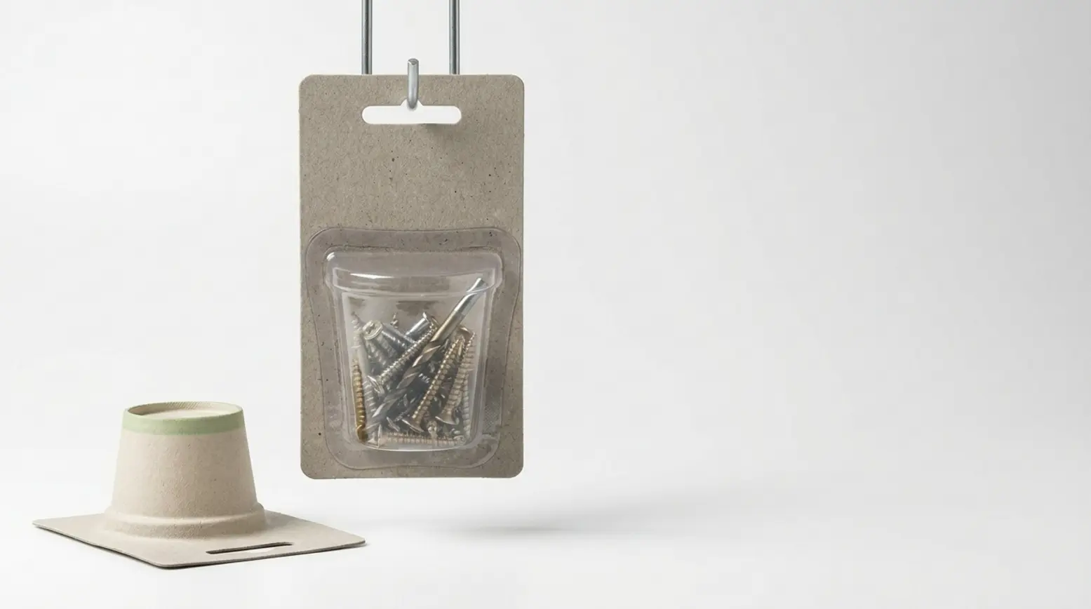 A retail blister package with metal hardware and a paper cup, set against a clean backdrop.