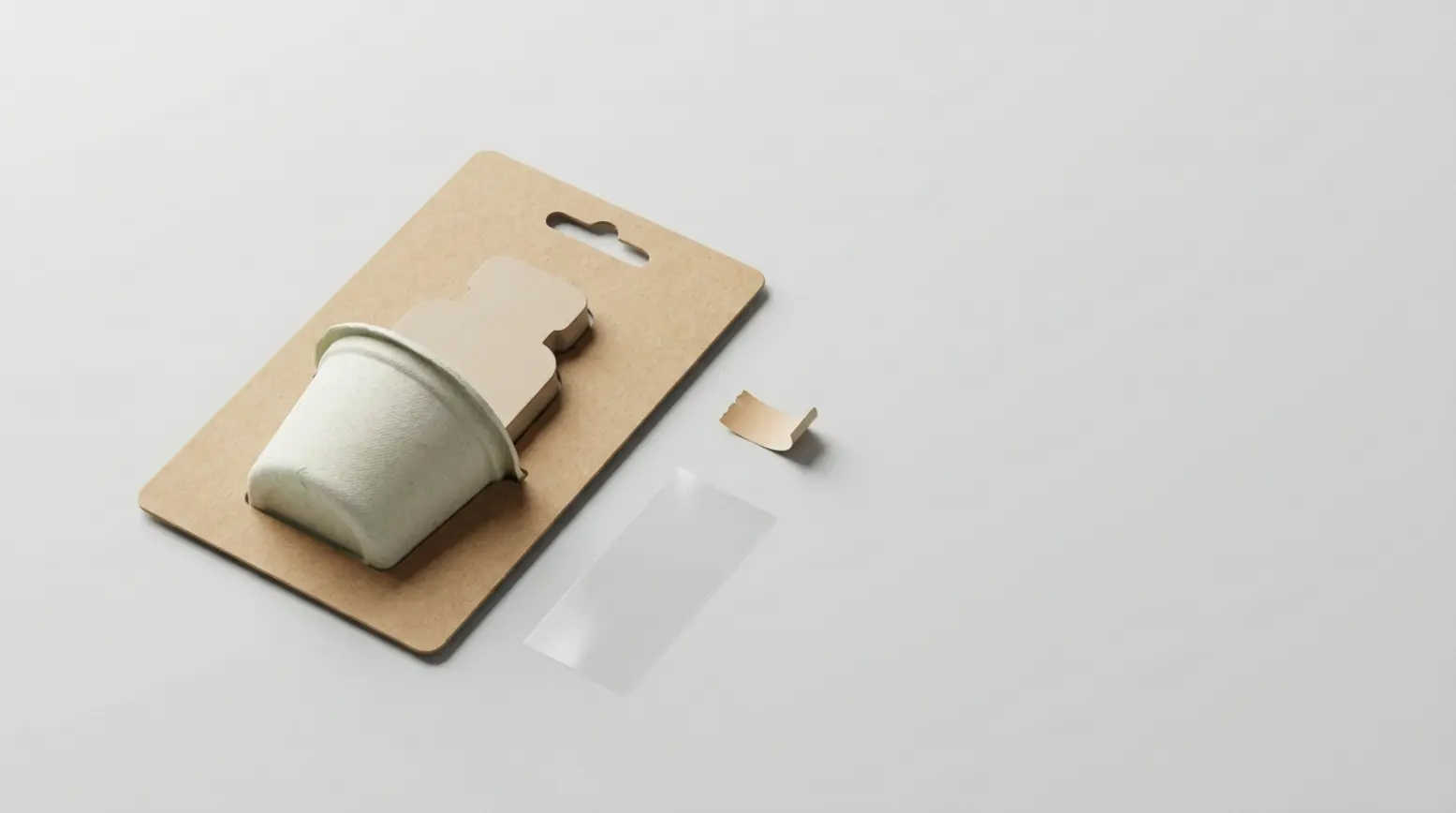 A natural kraft paper blister pack with neutral product, paired with a film window and label.
