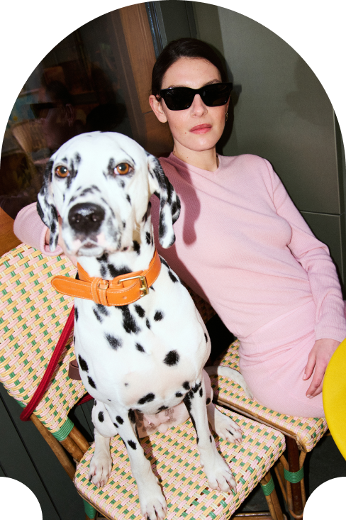 Dalmatian with a girl enjoying the terrace