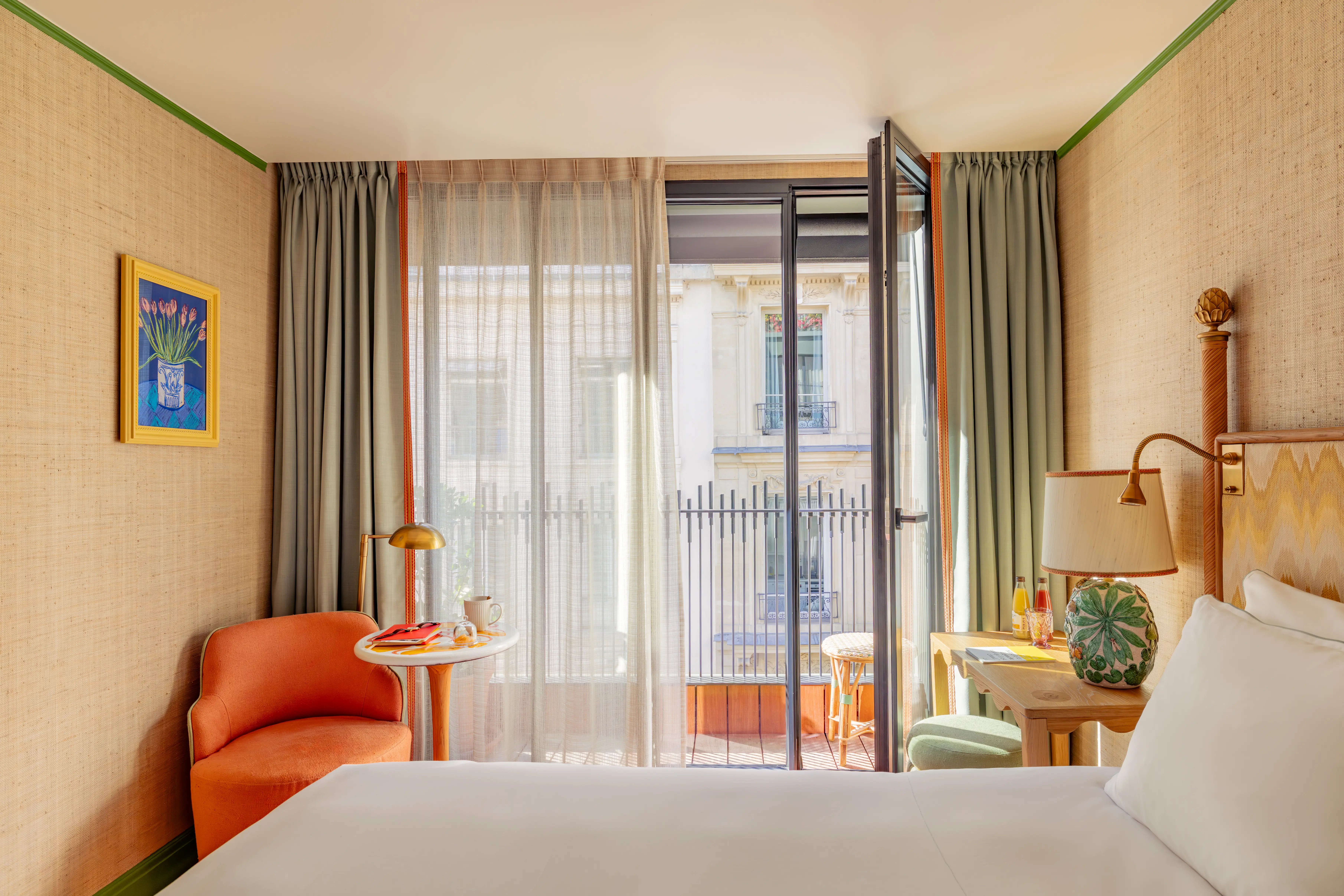 bed in comfort room with street views