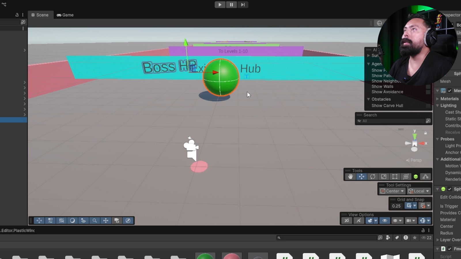 Screenshot of unity, a 3D game development software interface showing a scene with a green sphere labeled 'Boss HP' and a smaller white camera icon, with composer Amadeus Herrera wearing headphones visible in a circular inset at the top right corner.
