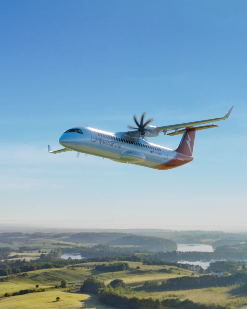 Maeve Aerospace electric aircraft flying above the landscape