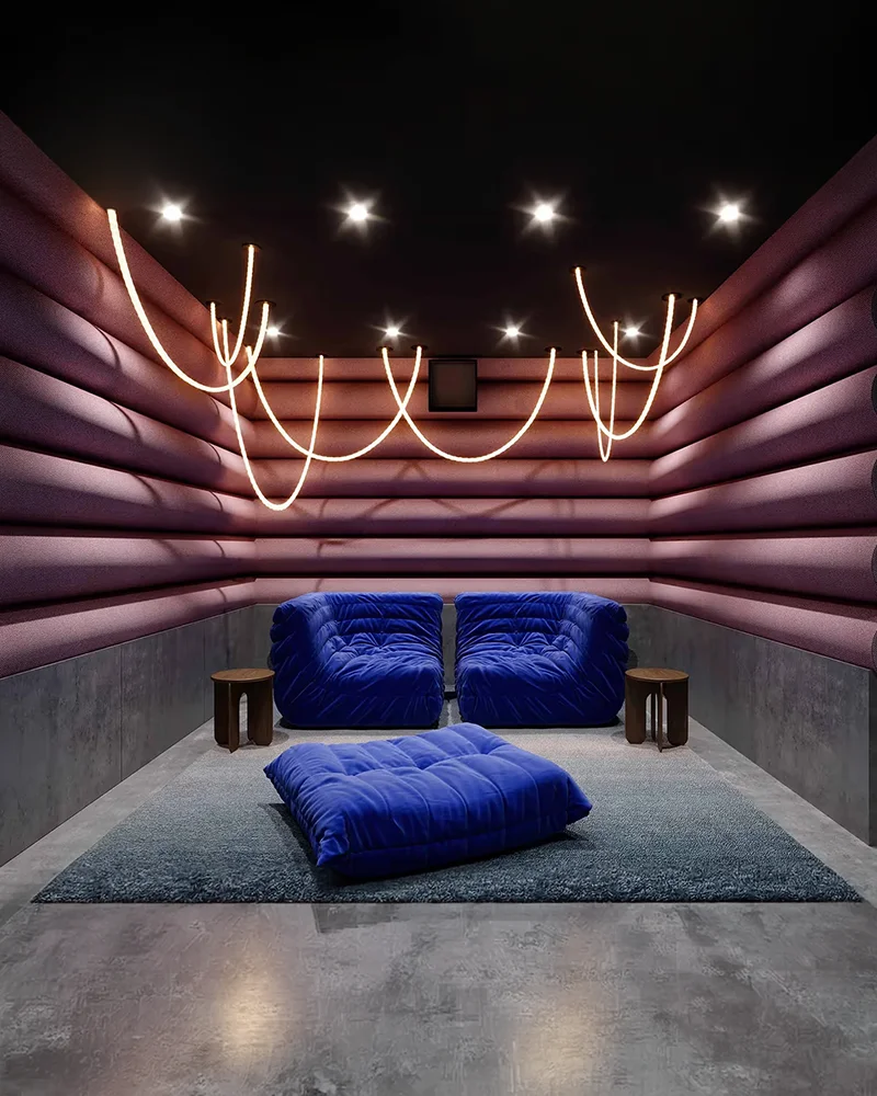 Privébioscoop van The (Any)Thing met blauwe banken en lichtlijnen