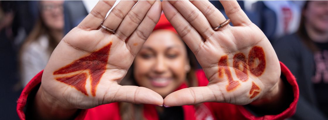 Delta employee celebrating the 100-year anniversary of the company.