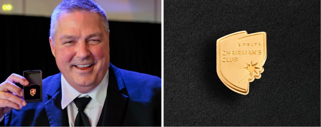 A Delta employee with the Chairman’s Club pin manufactured by O.C. Tanner.