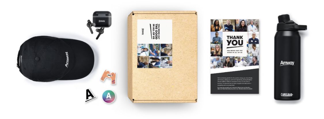 Amway’s custom swag boxes filled with branded gifts, fulfilled by O.C. Tanner.