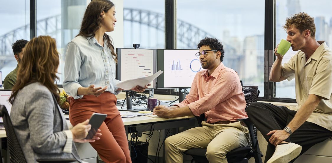 A team sharing ideas in a meeting