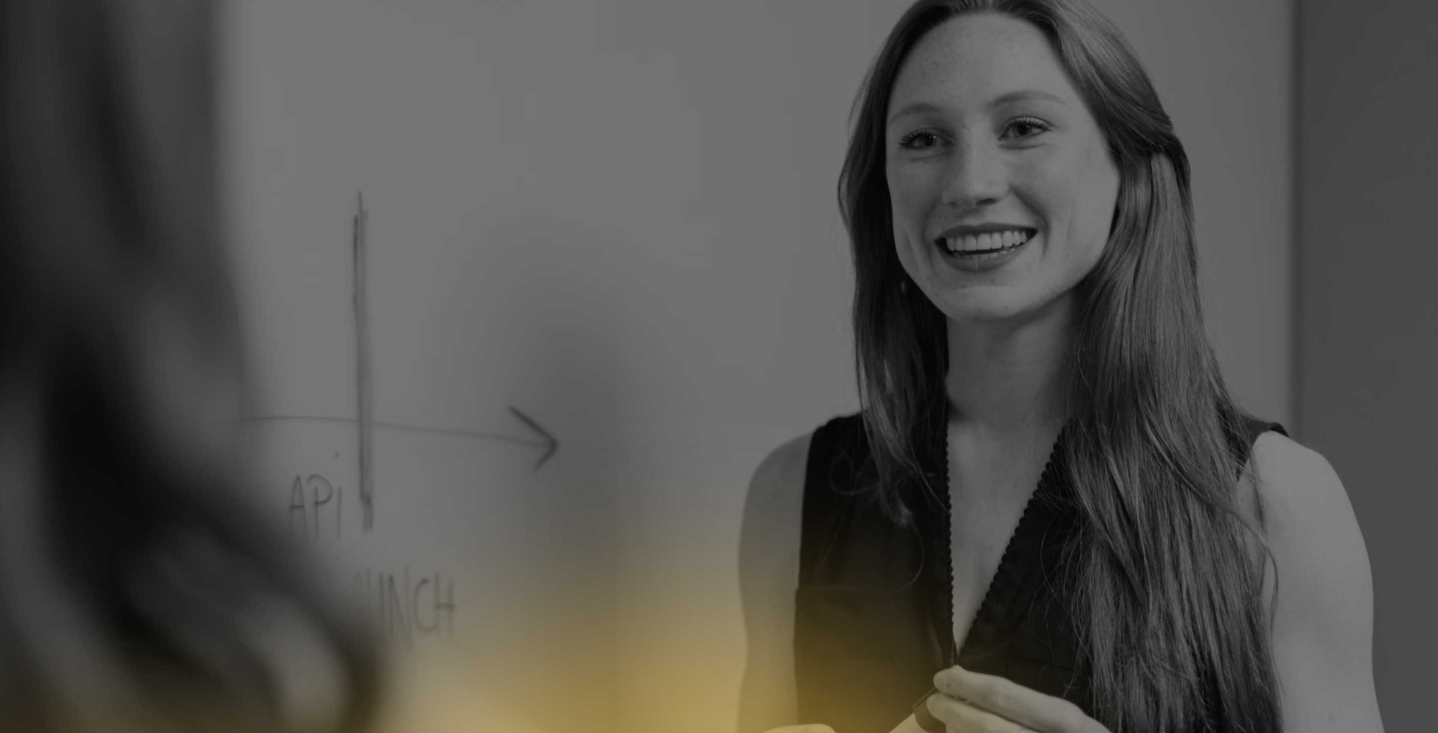 Woman presenting whiteboard