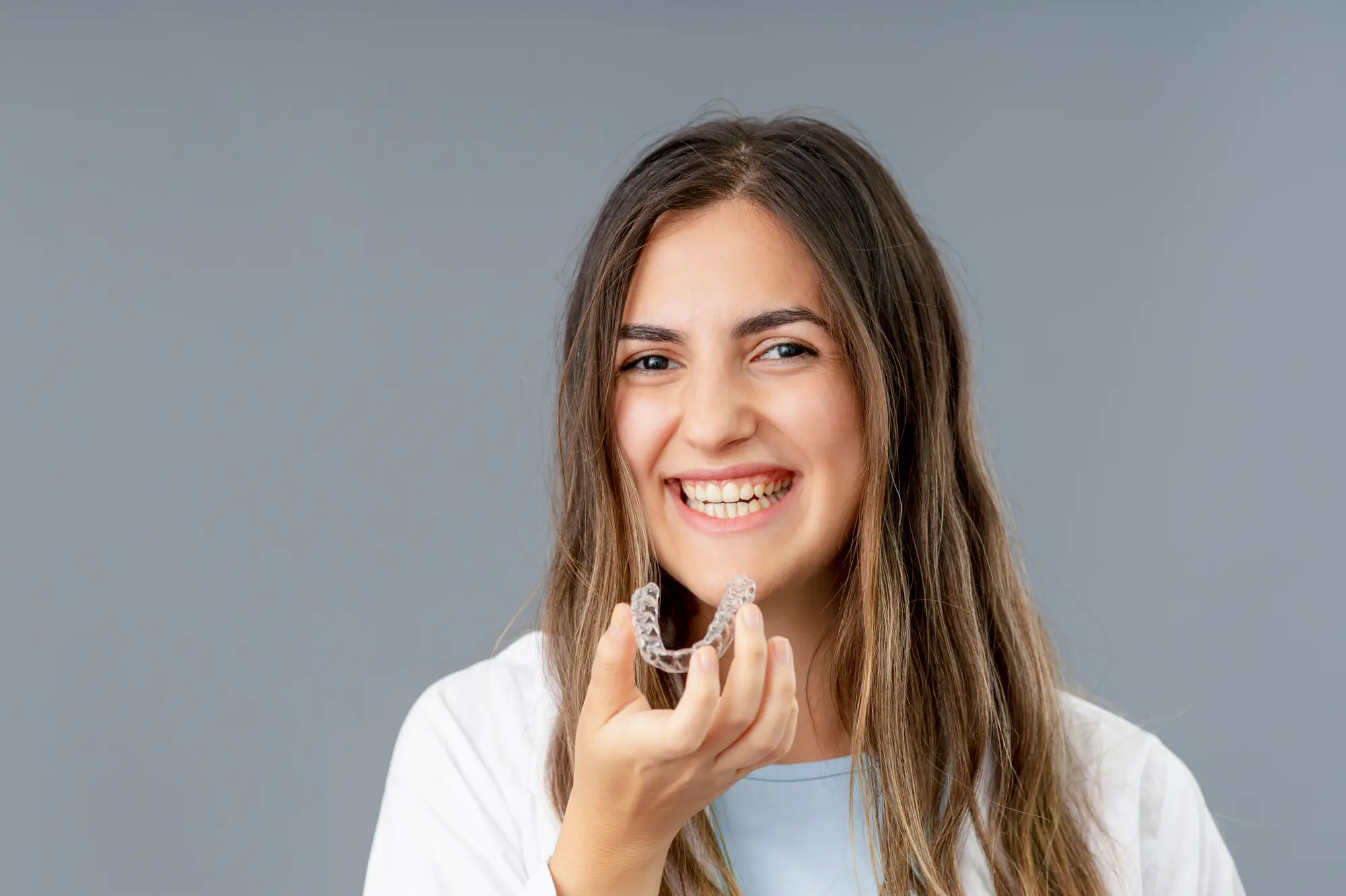 Clear Aligners vs. Braces: The Clear Choice for Katy Professionals and Students