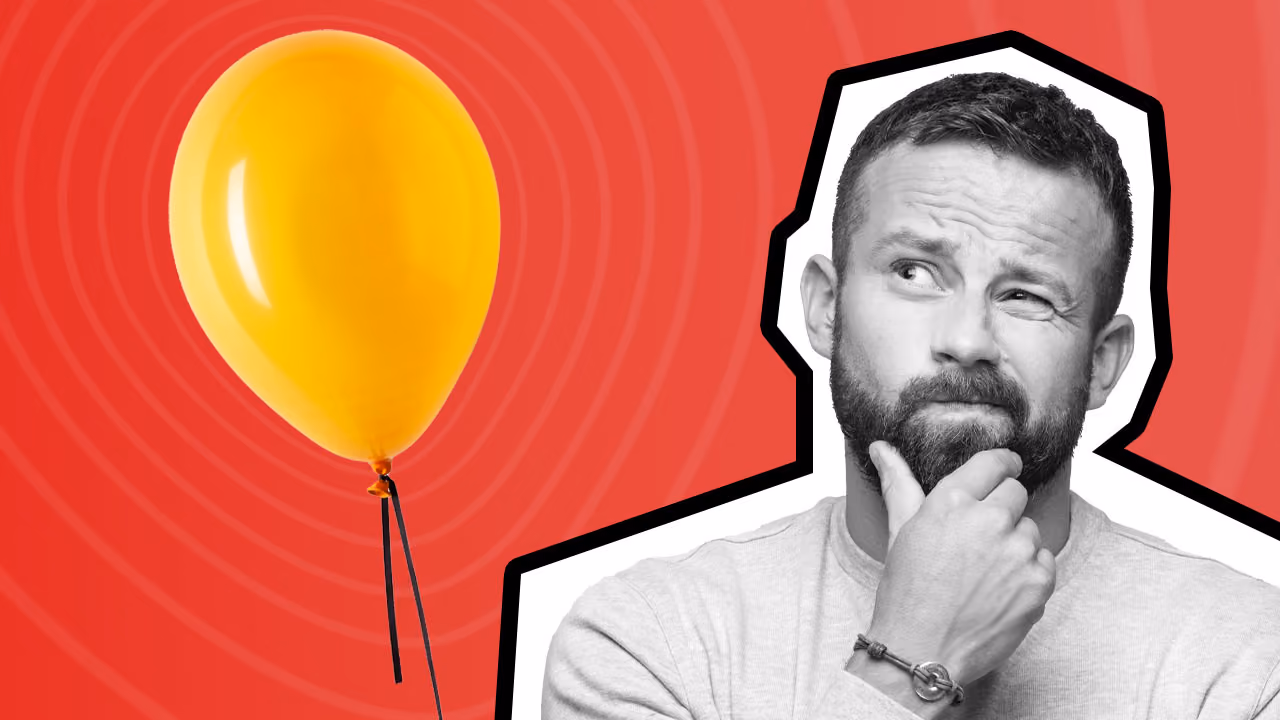 Man considering whether a balloon sinuplasty is painful looks at a yellow balloon