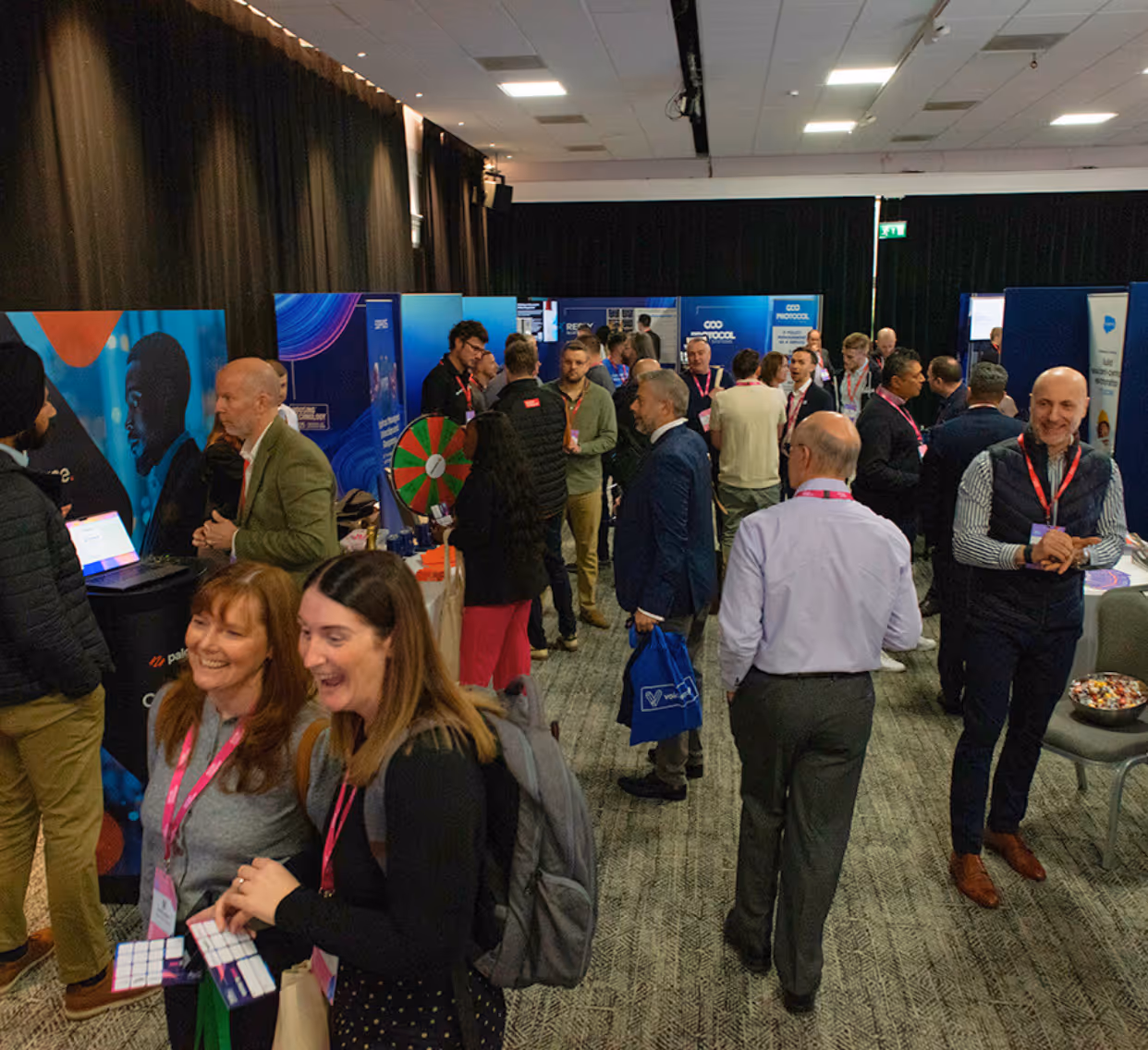 Image of George Grant and Alastair Tweedie on stage at the Housing Technology Conference